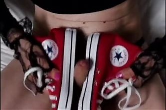 Red Converse sneakers shoe job featuring trans model Alexandra Braces